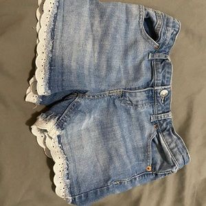 Denim shorts with lace bottoms